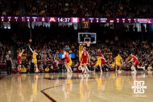 Nebraska Cornhusker guard Sam Hoiberg (1) makes a three-point shot from the corner against Minnesota Golden Gopher forward Cade Tyson (10) in the first half during a college men’s basketball game on Saturday, Jan. 24, 2026, in Minneapolis, Minnesota. Photo by John S. Peterson.
