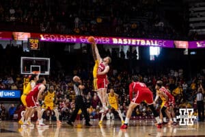 Nebraska Cornhusker forward Rienk Mast (51) reaches for the tip-off against the Minnesota Golden Gophers during a college men’s basketball game on Saturday, Jan. 24, 2026, in Minneapolis, Minnesota. Photo by John S. Peterson.