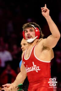 AJ Ferrari celebrates his win in the dual during a college wrestling dual Friday, Jan. 23rd, 2026, Lincoln, Nebraska. Photo by Braden Cochran.