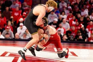 At 197, Nebraska Cornhusker Camden McDanel shoots for the leg against Iowa Hawkeye Brody Sampson during a college wrestling dual Friday, Jan. 23, 2026, Lincoln, Nebraska. Photo by Braden Cochran.