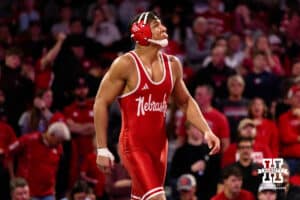 At 174, Nebraska Cornhusker Christopher Minto makes his way to the mat to take on Iowa Hawkeye Patrick Kennedy during a college wrestling dual Friday, Jan. 23, 2026, Lincoln, Nebraska. Photo by Braden Cochran.