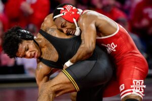 At 157, Nebraska Cornhusker Antrell Taylor fights to flip over Minnesota Gopher Jordan Williams during a college wrestling dual Friday, Jan. 23rd, 2026, Lincoln, Nebraska. Photo by Braden Cochran.
