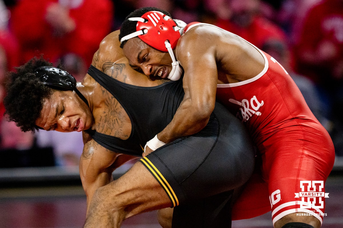 At 157, Nebraska Cornhusker Antrell Taylor fights to flip over Minnesota Gopher Jordan Williams during a college wrestling dual Friday, Jan. 23rd, 2026, Lincoln, Nebraska. Photo by Braden Cochran.