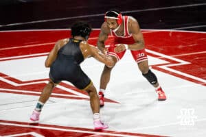 At 157, Nebraska wrestler Antrell Taylor watches his opponent before striking during a college wrestling dual Friday, Jan. 23rd, 2026, Lincoln, Nebraska. Photo by Braden Cochran.