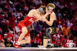 At 149, Nebraska Cornshusker Chance Lamer pushes against Iowa Hawkeye Ryder Block during a college wrestling dual Friday, Jan. 23, 2026, Lincoln, Nebraska. Photo by Braden Cochran.
