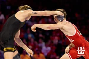 At 149, Nebraska Cornhusker Chance Lamer swipes against Iowa Hawkeye Ryder Block during a college wrestling dual Friday, Jan. 23, 2026, Lincoln, Nebraska. Photo by Braden Cochran.