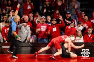 At 133, Nebraska fans cheer as Jacob Van dee makes a takes down Iowa Hawkeye Drake Ayala during a college wrestling dual Friday, Jan. 23, 2026, Lincoln, Nebraska. Photo by Braden Cochran.
