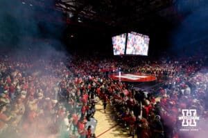 Nebraska Cornhuskers run out to take on the Iowa Hawkeyes during a college wrestling dual on Friday, Jan. 23, 2026, Lincoln, Nebraska. Photo by Braden Cochran.
