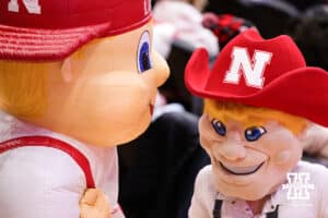 Nebraska Cornhusker mascots, Lil' Red and Herbie Husker, interact with fans during a college wrestling dual against the Iowa Hawkeyes on Friday, Jan. 23, 2026, in Lincoln, Nebraska. Photo by Braden Cochran.