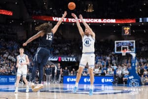 Creighton Bluejay Isaac Traudt (41) shoots over a three pointer during a college basketball game against Xavier on Jan 21, 2026, in Omaha, Nebraska. Photo by Brandon Tiedemann