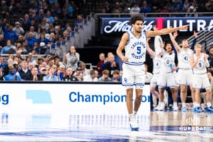 Creighton Bluejay Nik Graves (5) thanks a teammate during a college basketball game against Xavier on Jan 21, 2026, in Omaha, Nebraska. Photo by Brandon Tiedemann