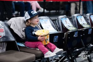 Omaha Supernovas fan watching the players warming up before taking on the Orlando Valkyries during a professional volleyball match on Sunday, Jan. 18, 2026, in Omaha, Nebraska. Photo by Jackson Luethje.