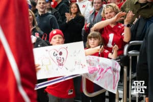 Nebraska Cornhusker fans cheer on the Nebraska Cornhuskers as they walk off the court after a 77-58 win over the Northwestern Wildcats in a college basketball game on Saturday, Jan. 17, 2026, in Evanston, Illinois. Photo by Kayla Wolf.