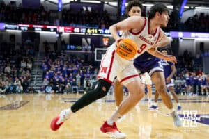 Nebraska Cornhuskers forward Berke Büyüktuncel (9) dribbles the ball against Northwestern Wildcats forward Tre Singleton (8) during the second half of a college basketball game on Saturday, Jan. 17, 2026, in Evanston, Illinois. Photo by Kayla Wolf.