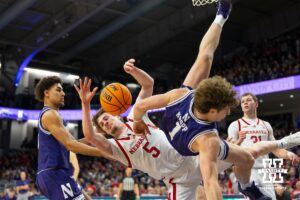Nebraska Cornhuskers forward Braden Frager (5) is fouled by Northwestern Wildcats forward Tyler Kropp (1) during the second half of a college basketball game on Saturday, Jan. 17, 2026, in Evanston, Illinois. Photo by Kayla Wolf.