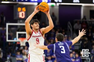 Nebraska Cornhuskers forward Berke Büyüktuncel (9) passes the ball against Northwestern Wildcats guard Jake West (3) during the second half of a college basketball game on Saturday, Jan. 17, 2026, in Evanston, Illinois. Photo by Kayla Wolf.