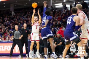 Nebraska Cornhuskers guard Sam Hoiberg (1) attempts a basket against Northwestern Wildcats forward Arrinten Page (22) during the second half of a college basketball game on Saturday, Jan. 17, 2026, in Evanston, Illinois. Photo by Kayla Wolf.