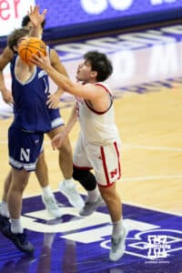Nebraska Cornhuskers forward Berke Büyüktuncel (9) scores against Northwestern Wildcats forward Tyler Kropp (1) during the first half of a college basketball game on Saturday, Jan. 17, 2026, in Evanston, Illinois. Photo by Kayla Wolf.