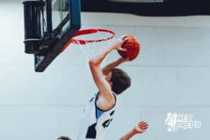 Omaha Concordia’s Blake Sunde (24) is scoring a bucket through contact during a high school basketball game against Gross Catholic on January 13, 2026 in Omaha, Nebraska. Photo By Jack Stephens.