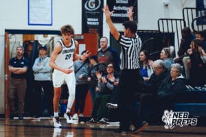 Omaha Concordia’s Elliotte McCafferty (20) is celebrating after draining a three pointer during a high school basketball game against Gross Catholic on January 13, 2026 in Omaha, Nebraska. Photo By Jack Stephens.