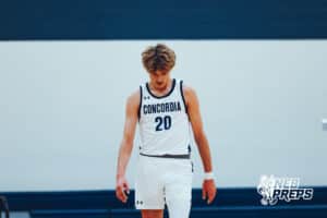 Omaha Concordia’s Elliotte McCafferty (20) is mentally preparing for what’s to come next while his teammate is shooting a free throw during a high school basketball game against Gross Catholic on January 13, 2026 in Omaha, Nebraska. Photo By Jack Stephens.
