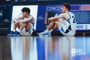 Omaha Concordia’s Lincoln Goetz (2) and Blake Sunde (24) are waiting to get subbed in during a high school basketball game against Gross Catholic on January 13, 2026 in Omaha, Nebraska. Photo By Jack Stephens.