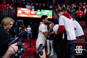 Nebraska Cornhusker guard Jamarques Lawrence (10) signs an autograph after the win over the Oregon Ducks during a college men’s basketball game on Tuesday, Jan. 13, 2026, in Lincoln, Nebraska. Photo by John S. Peterson.