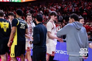 Nebraska Cornhusker forward Braden Frager (5) and forward Pryce Sandfort (21) shake hands after the win ove the Oregon Ducks during a college men’s basketball game on Tuesday, Jan. 13, 2026, in Lincoln, Nebraska. Photo by John S. Peterson.