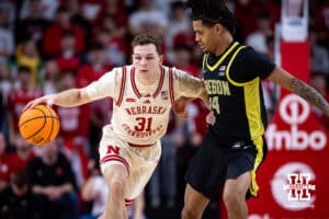 Nebraska Cornhusker guard Cale Jacobsen (31) dribbles the ball against Oregon Duck guard Jamari Phillips (24) in the second half during a college men’s basketball game on Tuesday, Jan. 13, 2026, in Lincoln, Nebraska. Photo by John S. Peterson.