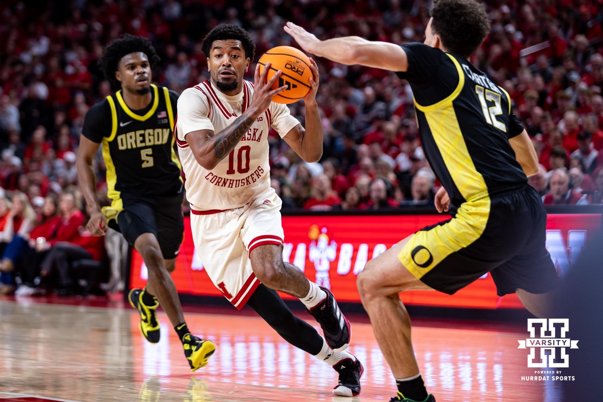 Nebraska Cornhusker guard Jamarques Lawrence (10) drives to the basket against Oregon Duck guard Drew Carter (12) in the second half during a college men’s basketball game on Tuesday, Jan. 13, 2026, in Lincoln, Nebraska. Photo by John S. Peterson.