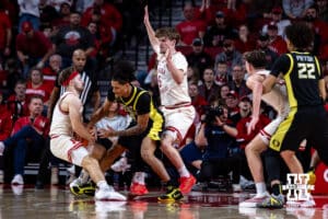 Nebraska Cornhusker guard Sam Hoiberg (1) steals the ball away from Oregon Duck forward Dezdrick Lindsay (4) in the first half during a college men’s basketball game on Tuesday, Jan. 13, 2026, in Lincoln, Nebraska. Photo by John S. Peterson.