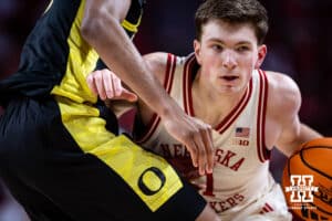 Nebraska Cornhusker forward Pryce Sandfort (21) drives into Oregon Duck forward Kwame Evans Jr. (10) in the first half during a college men’s basketball game on Tuesday, Jan. 13, 2026, in Lincoln, Nebraska. Photo by John S. Peterson.