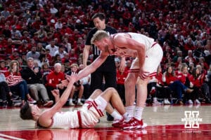 Nebraska Cornhusker forward Rienk Mast (51) helps forward Pryce Sandfort (21) get up off the court after a lay up against the Oregon Ducks in the first half during a college men’s basketball game on Tuesday, Jan. 13, 2026, in Lincoln, Nebraska. Photo by John S. Peterson.