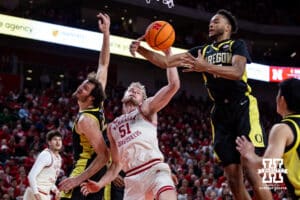 Nebraska Cornhusker forward Rienk Mast (51) fights for the rebound against Oregon Duck forward Sean Stewart (13) in the first half during a college men’s basketball game on Tuesday, Jan. 13, 2026, in Lincoln, Nebraska. Photo by John S. Peterson.