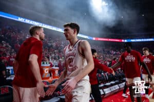 Nebraska Cornhusker forward Pryce Sandfort (21) gives forward Rienk Mast (51) five before taking on the Oregon Ducks during a college men’s basketball game on Tuesday, Jan. 13, 2026, in Lincoln, Nebraska. Photo by John S. Peterson.