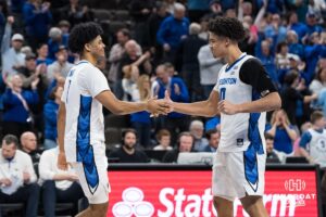 Creighton Bluejays Austin Swartz (1) and Jasen Green (0) high five during a college basketball game against Georgetown on Jan 13, 2026, in Omaha, Nebraska. Photo by Brandon Tiedemann