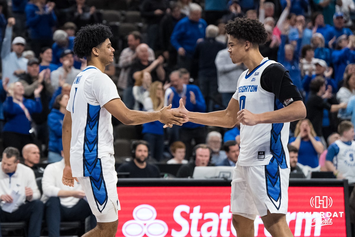 Creighton Bluejays Austin Swartz (1) and Jasen Green (0) high five during a college basketball game against Georgetown on Jan 13, 2026, in Omaha, Nebraska. Photo by Brandon Tiedemann
