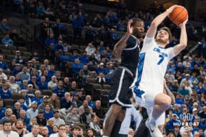 Creighton Bluejay Fedor Žugić (7) draws a foul from Jeremiah Williams (25) during a college basketball game against Georgetown on Jan 13, 2026, in Omaha, Nebraska. Photo by Brandon Tiedemann