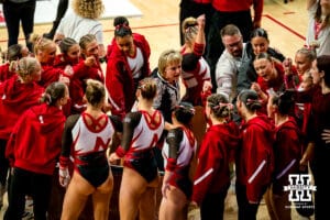 Nebraska Cornhusker head coach Heather Brink breaks the huddle after on the uneven bars during the Ameritas Master’s Classic women's gymnastic meet on Saturday, Jan. 10, 2026, in Lincoln, Nebraska. Photo by Braden Cochran.