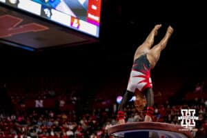 Nebraska Cornhusker Karys Griffin performs a stunt off the vault during the Ameritas Master’s Classic women's gymnastic meet on Saturday, Jan. 10, 2026, in Lincoln, Nebraska. Photo by Braden Cochran.