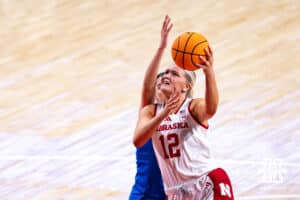 Nebraska Cornhusker forward Jessica Petrie (12) makes a lay up against UCLA Bruin forward Angela Dugalić (32) in the third quarter during a college women’s basketball game on Sunday, Jan. 11, 2026, in Lincoln, Nebraska. Photo by John S. Peterson.