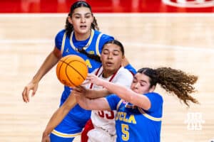 Nebraska Cornhusker forward Amiah Hargrove (33) blocks UCLA Bruin guard Charlisse Leger-Walker (5) in the third quarter during a college women’s basketball game on Sunday, Jan. 11, 2026, in Lincoln, Nebraska. Photo by John S. Peterson.