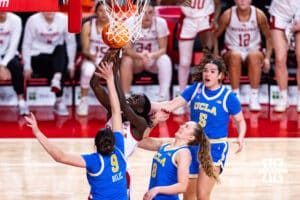 Nebraska Cornhusker forward Eliza Maupin (21) makes a lay up against UCLA Bruin guard Lena Bilic (9) in the third quarter during a college women’s basketball game on Sunday, Jan. 11, 2026, in Lincoln, Nebraska. Photo by John S. Peterson.