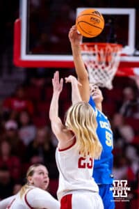 UCLA Bruin center Lauren Betts (51) blocks a shot from Nebraska Cornhusker guard Britt Prince (23) in the second half during a college women’s basketball game on Sunday, Jan. 11, 2026, in Lincoln, Nebraska. Photo by John S. Peterson.