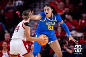 Nebraska Cornhusker guard Callin Hake (14) guarded by UCLA Bruin center Lauren Betts (51) in the third quarter during a college women’s basketball game on Sunday, Jan. 11, 2026, in Lincoln, Nebraska. Photo by John S. Peterson.