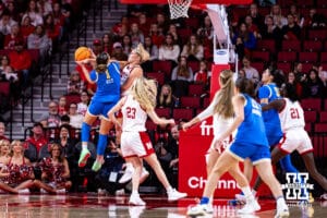 Nebraska Cornhusker forward Jessica Petrie (12) blocks UCLA Bruin guard Kiki Rice (1) in the first half during a college women’s basketball game on Sunday, Jan. 11, 2026, in Lincoln, Nebraska. Photo by John S. Peterson.