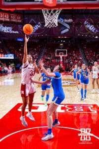 Nebraska Cornhusker forward Amiah Hargrove (33) makes a lay up against the UCLA Bruins in the first half during a college women’s basketball game on Sunday, Jan. 11, 2026, in Lincoln, Nebraska. Photo by John S. Peterson.