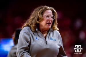 UCLA Bruin head coach Cori Close walk along the sideline against the Nebraska Cornhuskers in the first half during a college women’s basketball game on Sunday, Jan. 11, 2026, in Lincoln, Nebraska. Photo by John S. Peterson.