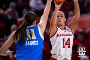 Nebraska Cornhusker guard Callin Hake (14) makes a three point shot against UCLA Bruin forward Gabriela Jaquez (11) in the first quarter during a college women’s basketball game on Sunday, Jan. 11, 2026, in Lincoln, Nebraska. Photo by John S. Peterson.