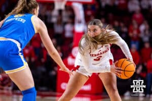 Nebraska Cornhusker guard Logan Nissley (2) takes on UCLA Bruin guard Gianna Kneepkens (8) in the first quarter during a college women’s basketball game on Sunday, Jan. 11, 2026, in Lincoln, Nebraska. Photo by John S. Peterson.